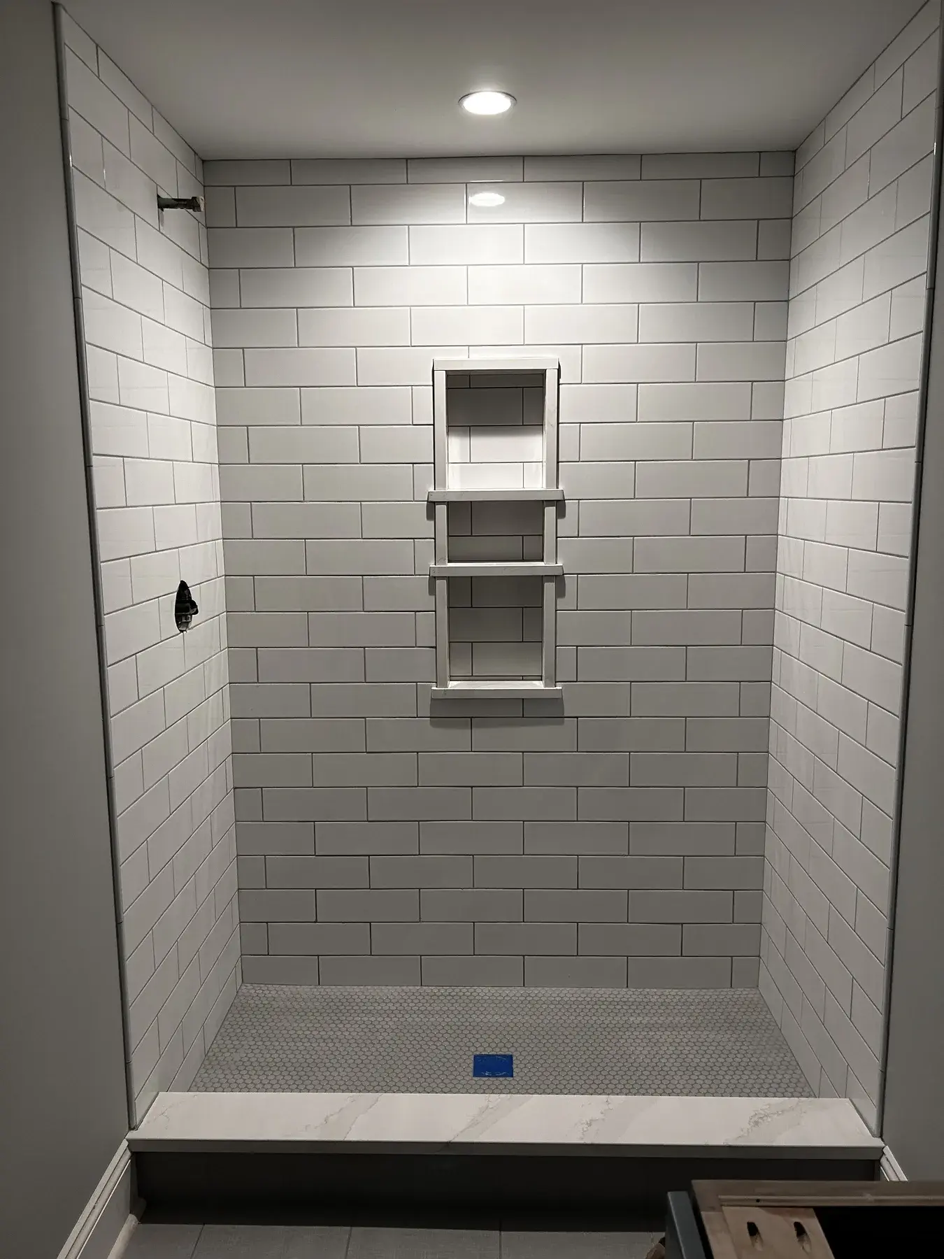 Shower Detail completed by ARA Flooring